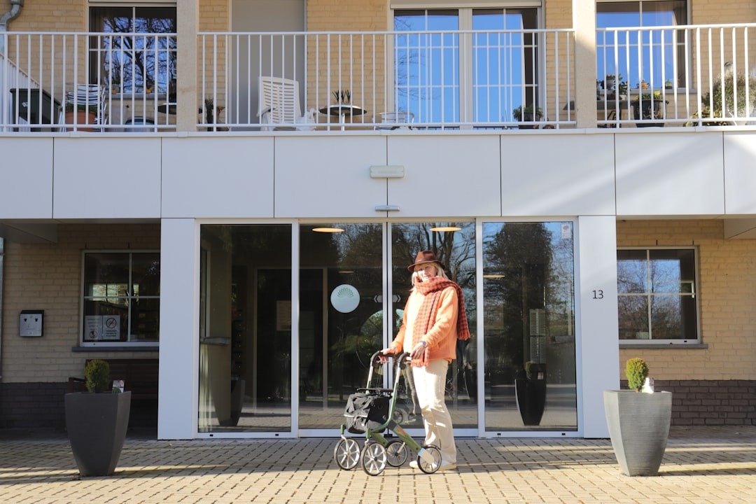 Woman in front of accessible entrance