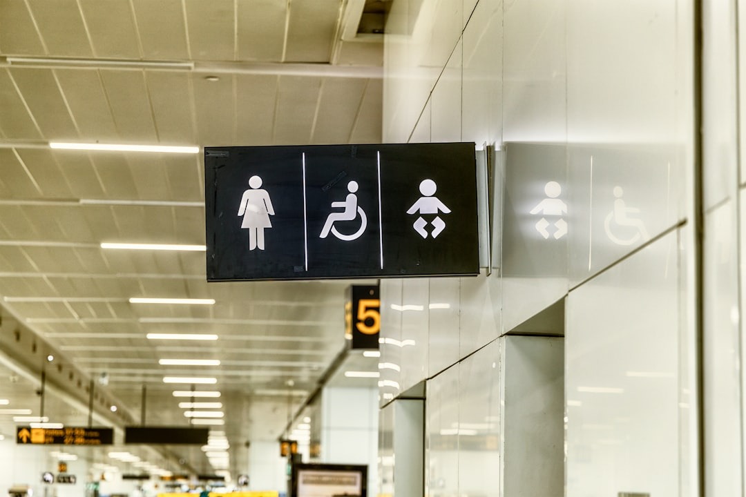 accessible bathroom signage in transit station