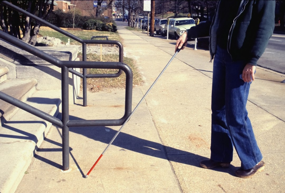 vision impaired person with cane