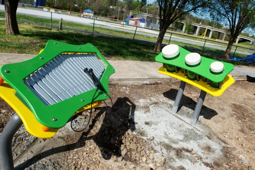 New inclusive playground equipment being installed at Landreth Park. Photo by Roger Nomer; published in The Joplin Globe