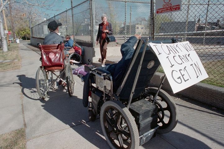 Two major obstacles disabled people face while voting in person are waiting in lines and accessing voting sites. (File photo from Nov. 8, 1988, Denver, Colorado)